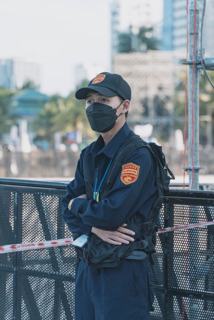 Security officer in uniform standing outdoors